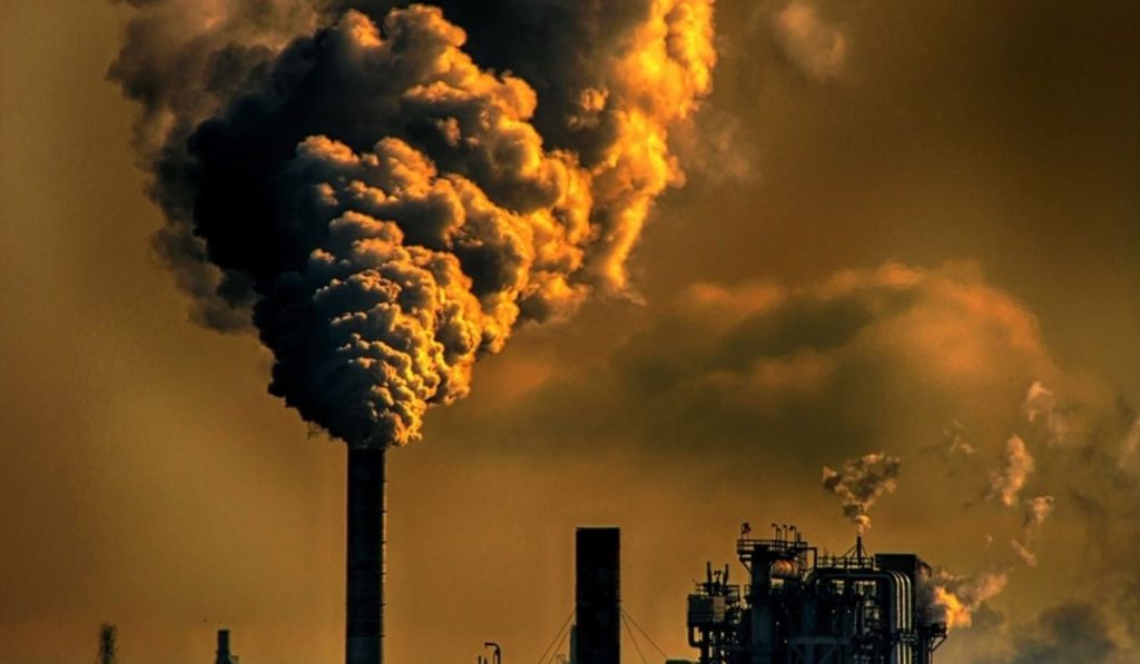 emission of carbon gas into the atmosphere leading to air pollution