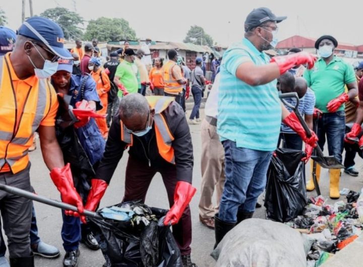 LAWMA officials cleaning the streets of Lagos