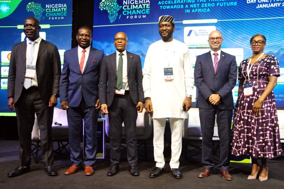 Group photo of 5 men and a woman