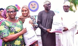 Aliko Dangote and governor Sanwo-Olu of Lagos State with others in a group photo