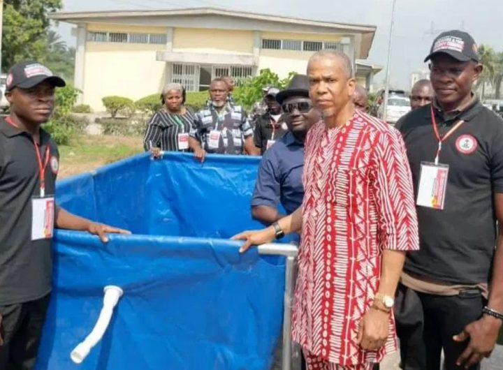 Senator Ede Dafinone with other men in a group photo