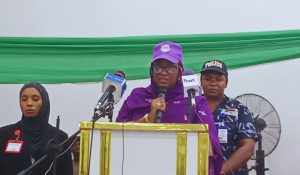 Woman speaking on podium