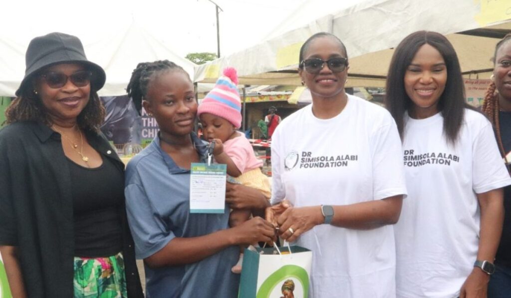 From L-R: Permanent Secretary, Lagos State Health Management Agency (LASHMA), Dr. Emmanuella Zamba; Beneficiary, Mrs. Chiamaka John; Special Adviser to the Lagos State Governor on Health, Dr. (Mrs.) Kemi Ogunyemi and the Founder, Dr. Simisola Alabi Foundation, Dr. Simisola Alabi at the Healthy Mothers and Thriving Children Community Outreach Programme sponsored by the Foundation in Partnership with the Lagos State Government at Obalende on Saturday