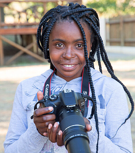 Canon Young People Programme and MED-EL expand to Nigeria, empowering hearing-impaired youth through photography 