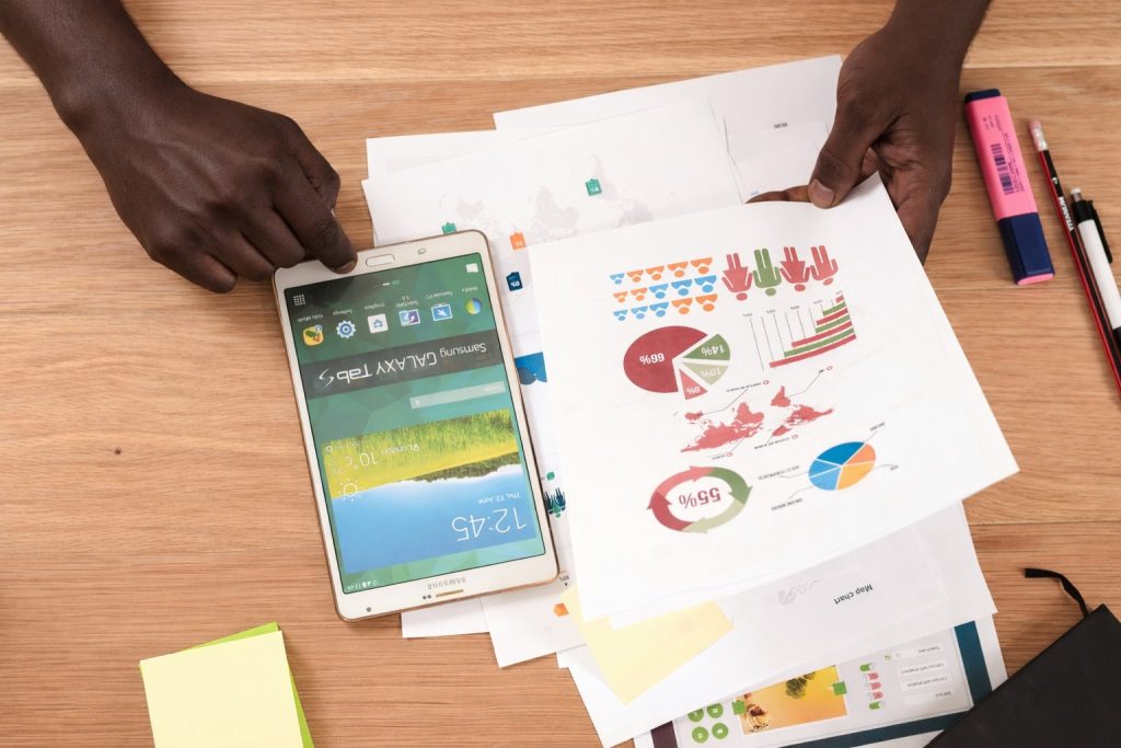 Image of man looking through a report