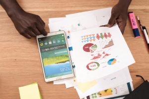 Image of man looking through a report