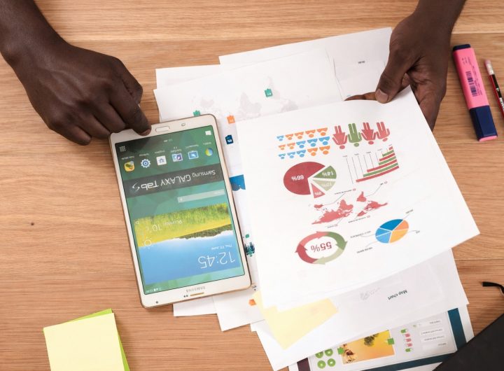 Image of man looking through a report