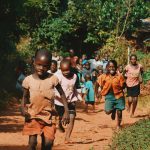 African children running happily