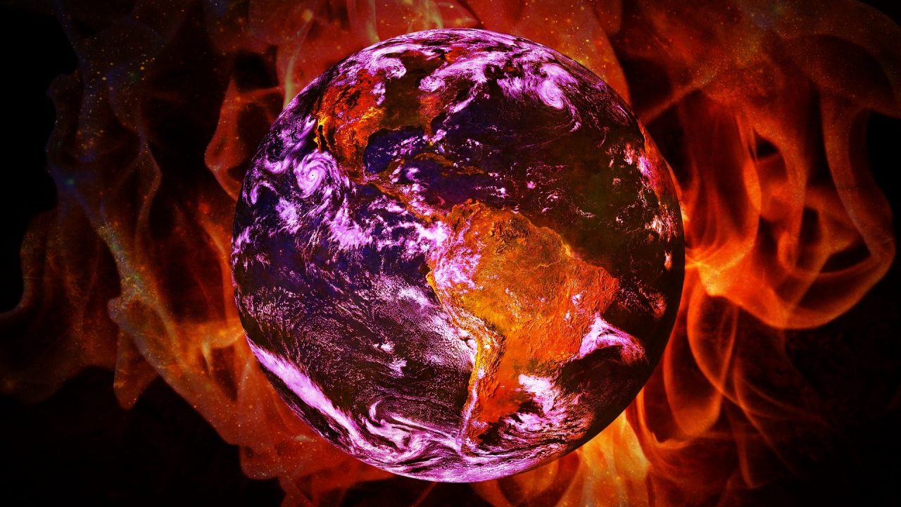 The globe of the earth surrounded by fire