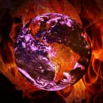 The globe of the earth surrounded by fire