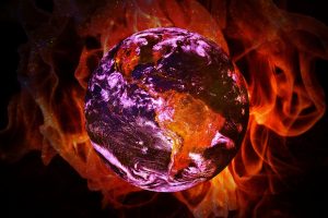 The globe of the earth surrounded by fire