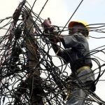Jumble of Wire with Electrician.