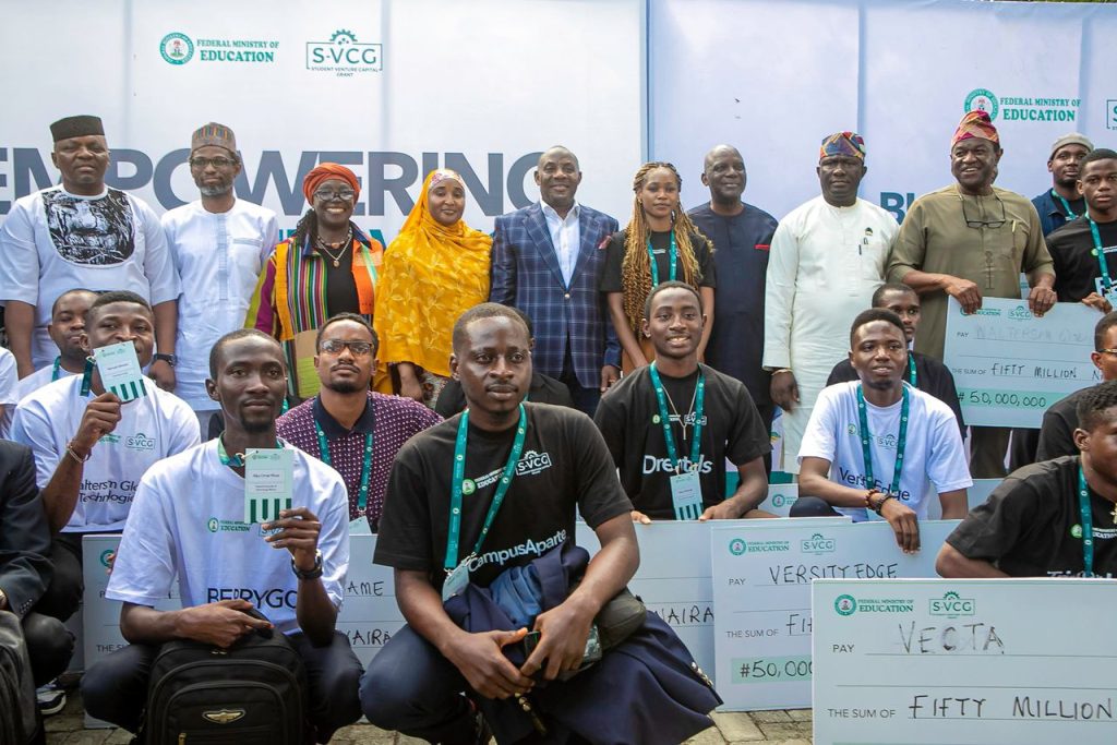 Winners of the SVCG pose with minister