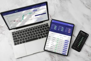 Investments on Laptop, tablet and phone screens