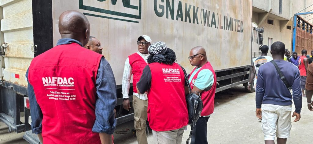 NAFDAC Officials at a business.