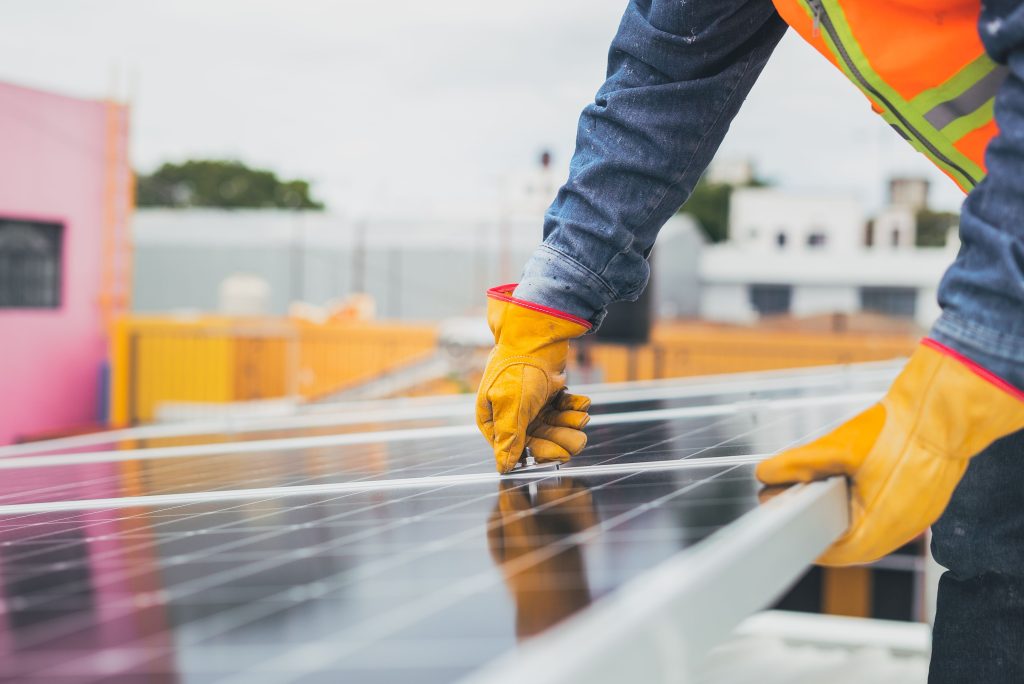 Working on a solar panel