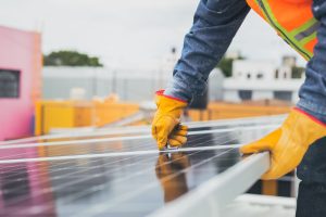 Working on a solar panel