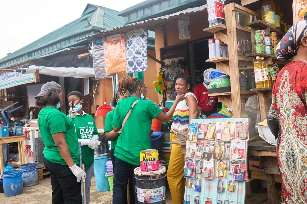 Fidson staff volunteers discuss health and cleaning