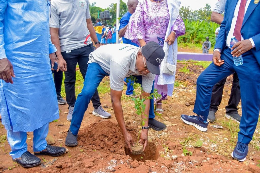 Nigeria customs officials planting tree at Ife Girls High School